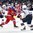 BUFFALO, NEW YORK - JANUARY 2: Russia's Klim Kostin #24 lets a shot go while USA's Ryan Lindgren #5 defends during quarterfinal round action at the 2018 IIHF World Junior Championship. (Photo by Matt Zambonin/HHOF-IIHF Images)

